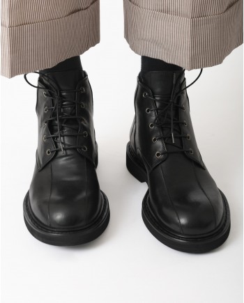 Bottines noires à lacets et à surpiqûres en cuir Premiata 