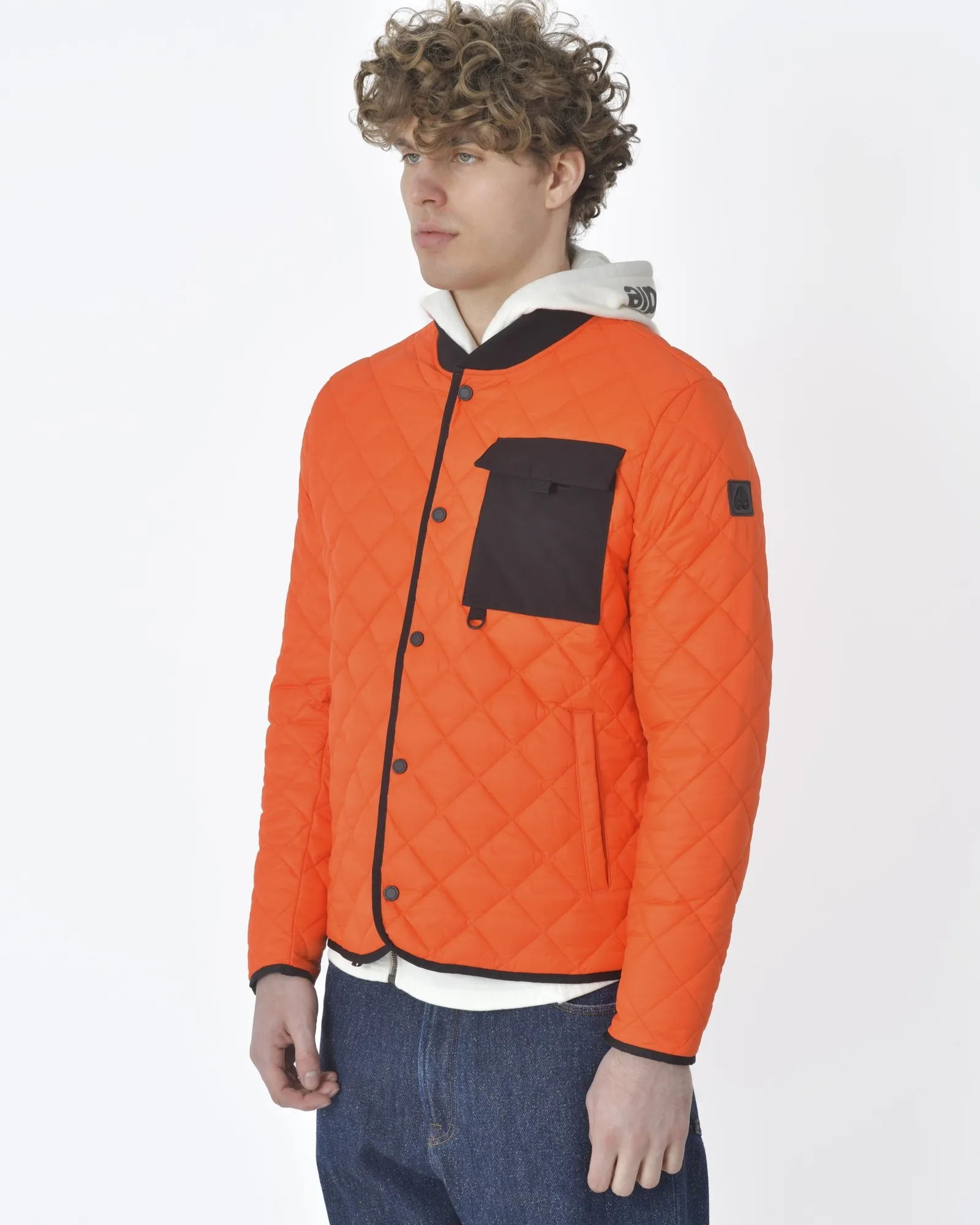 Veste matelassée orange Moose Knuckles 