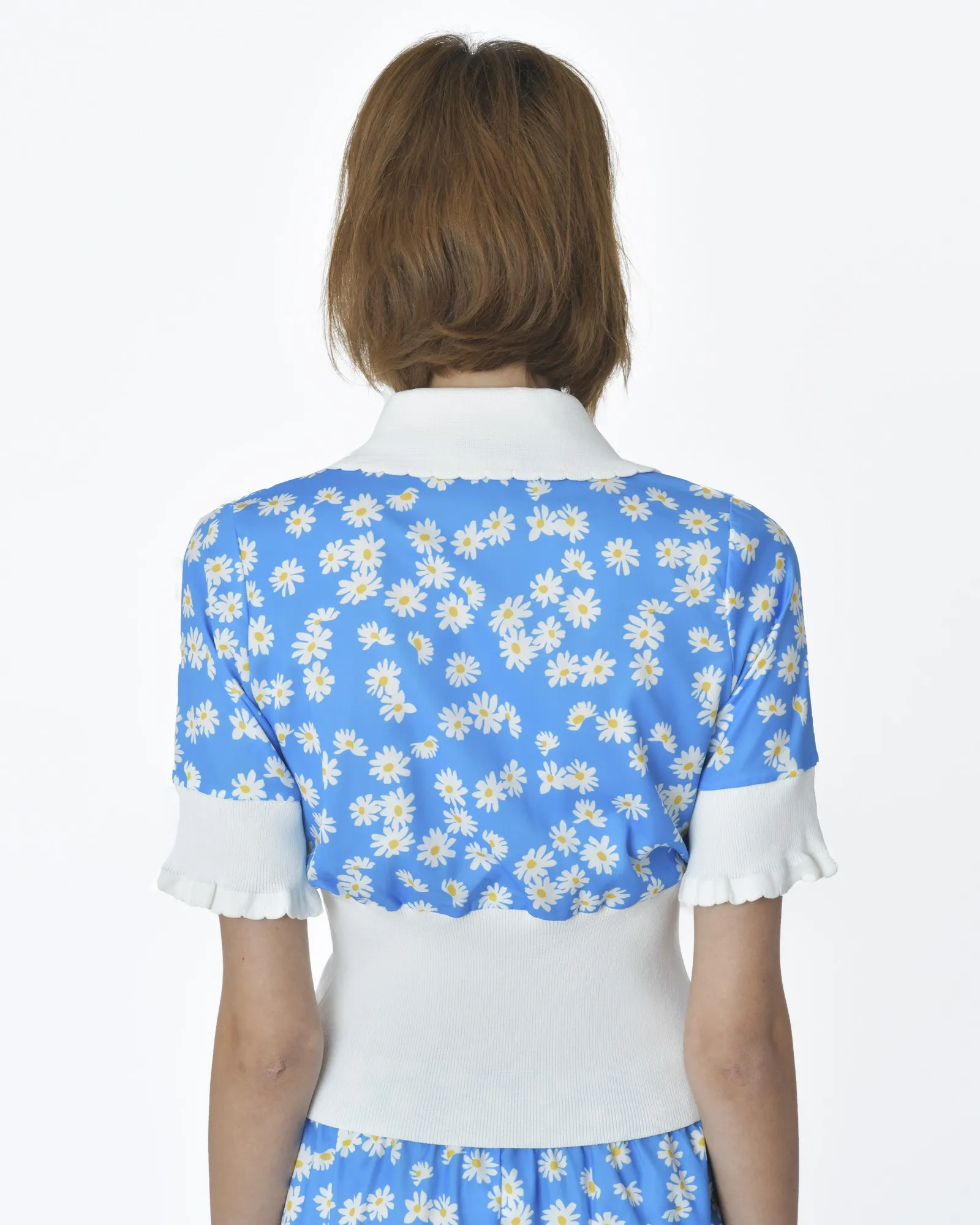 Top bleu à motifs marguerite Edward Achour 