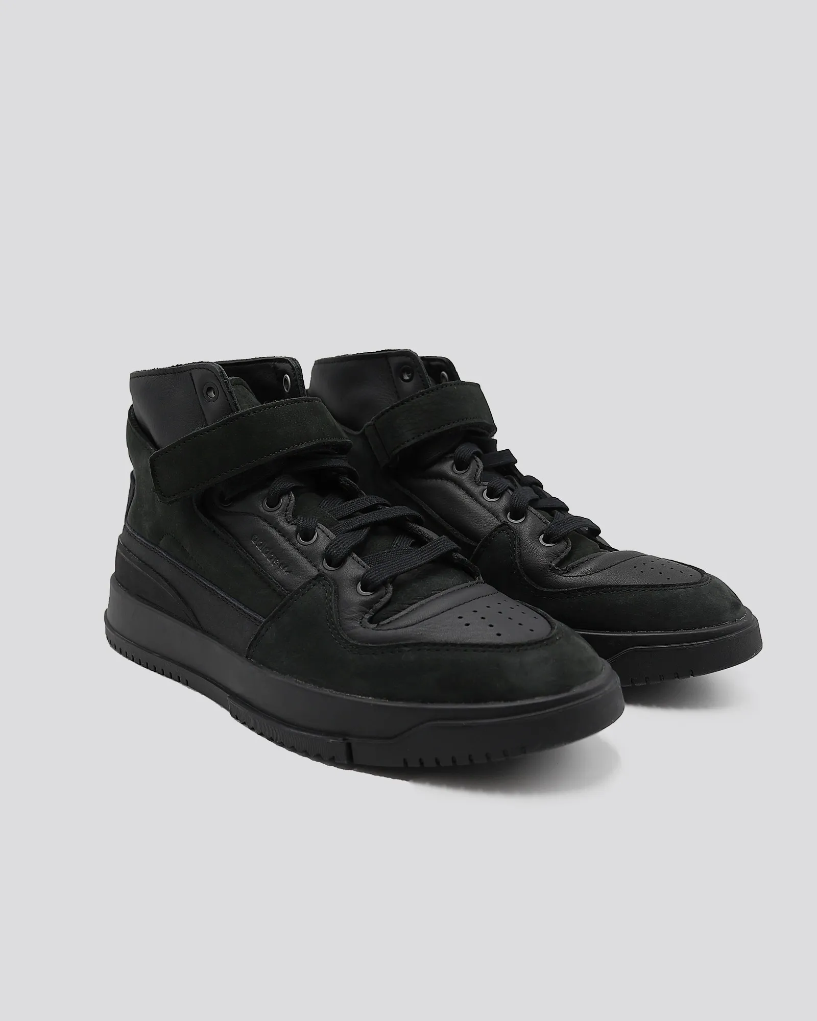 Baskets montante en cuir noir Adidas 