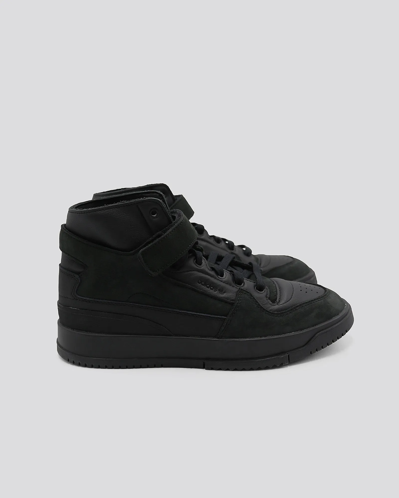 Baskets montante en cuir noir Adidas 