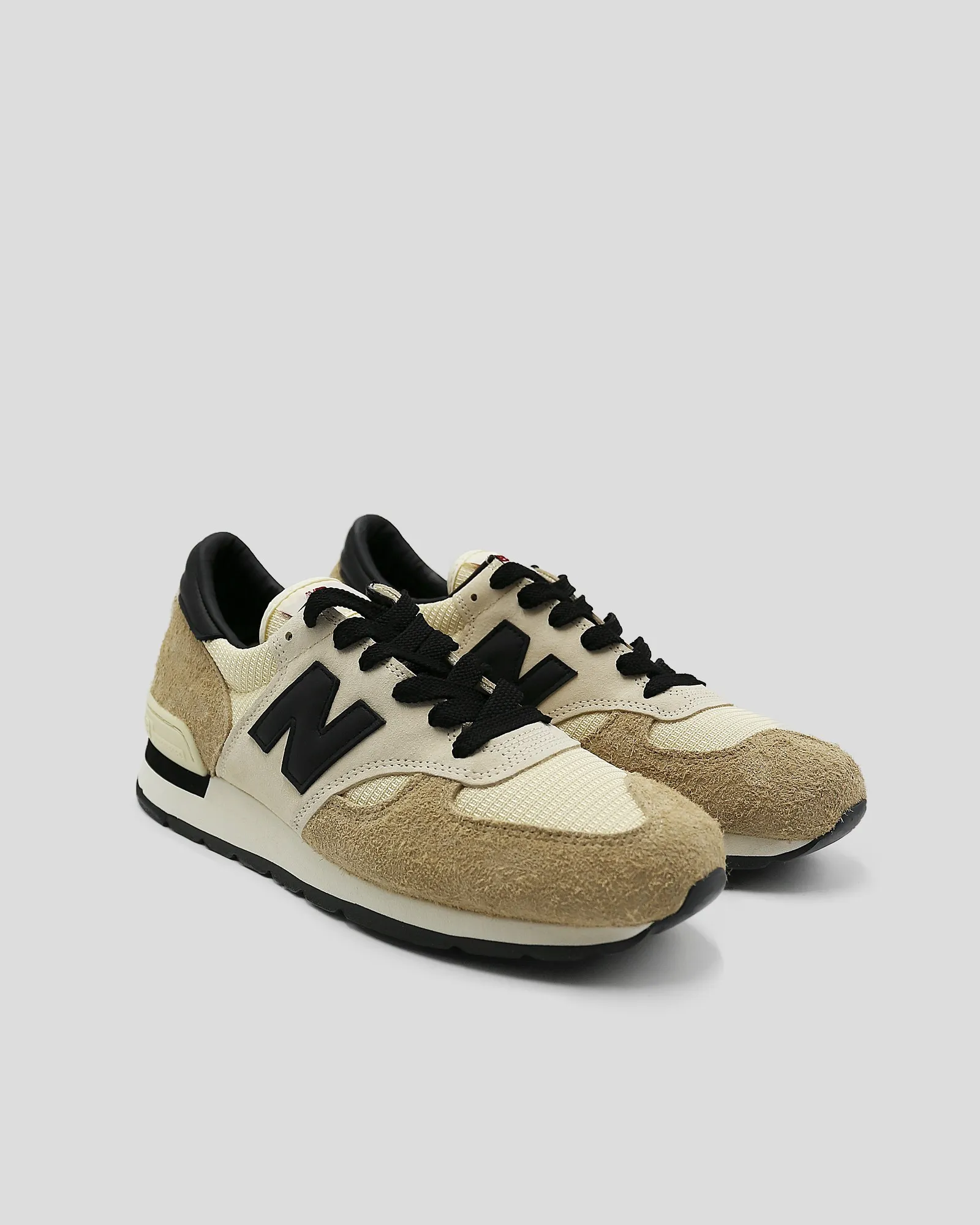 Baskets beige et noire en daim et toile New Balance 