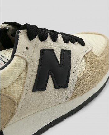 Baskets beige et noire en daim et toile New Balance 