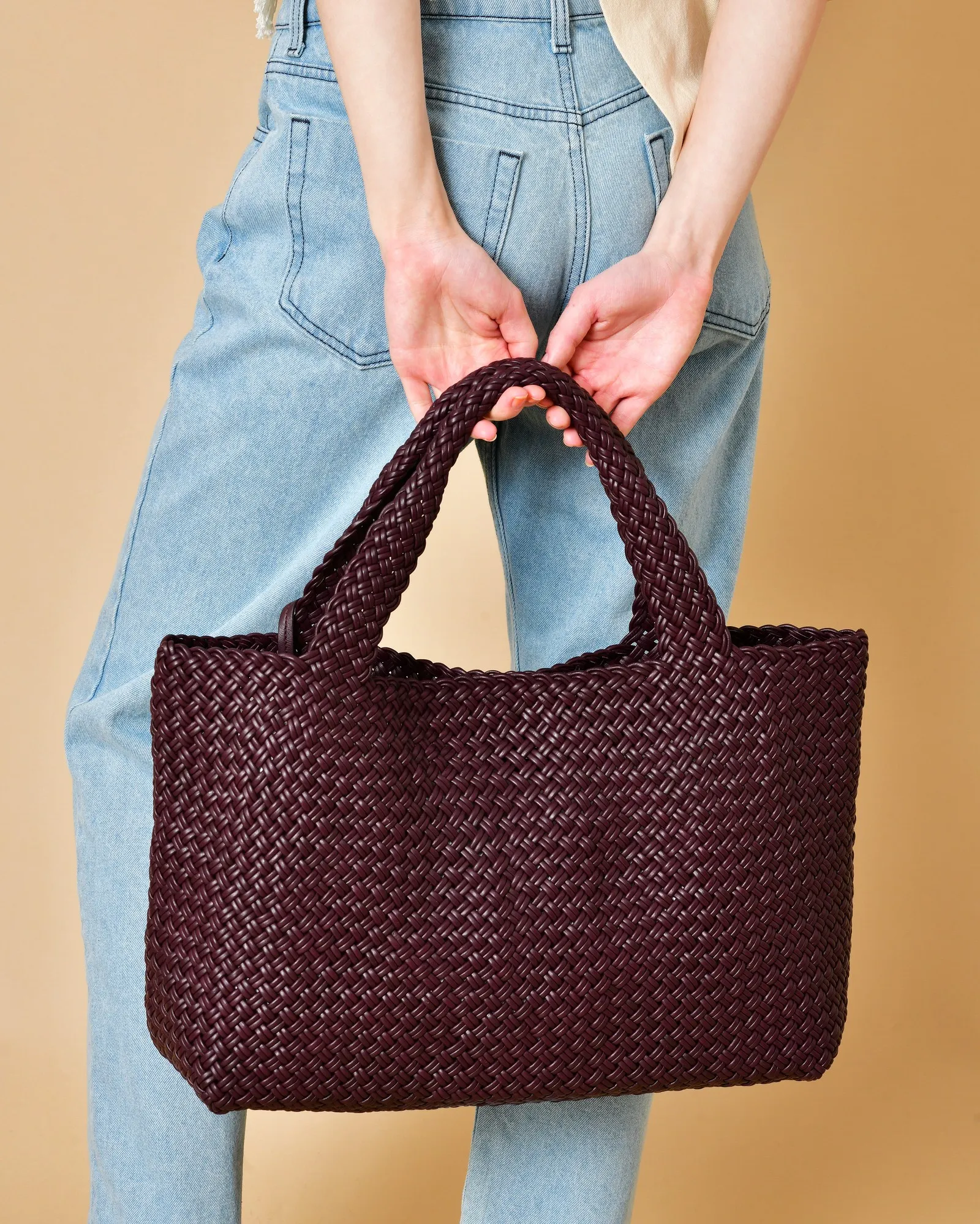 Sac à main pourpre en cuir tressé Falorni 