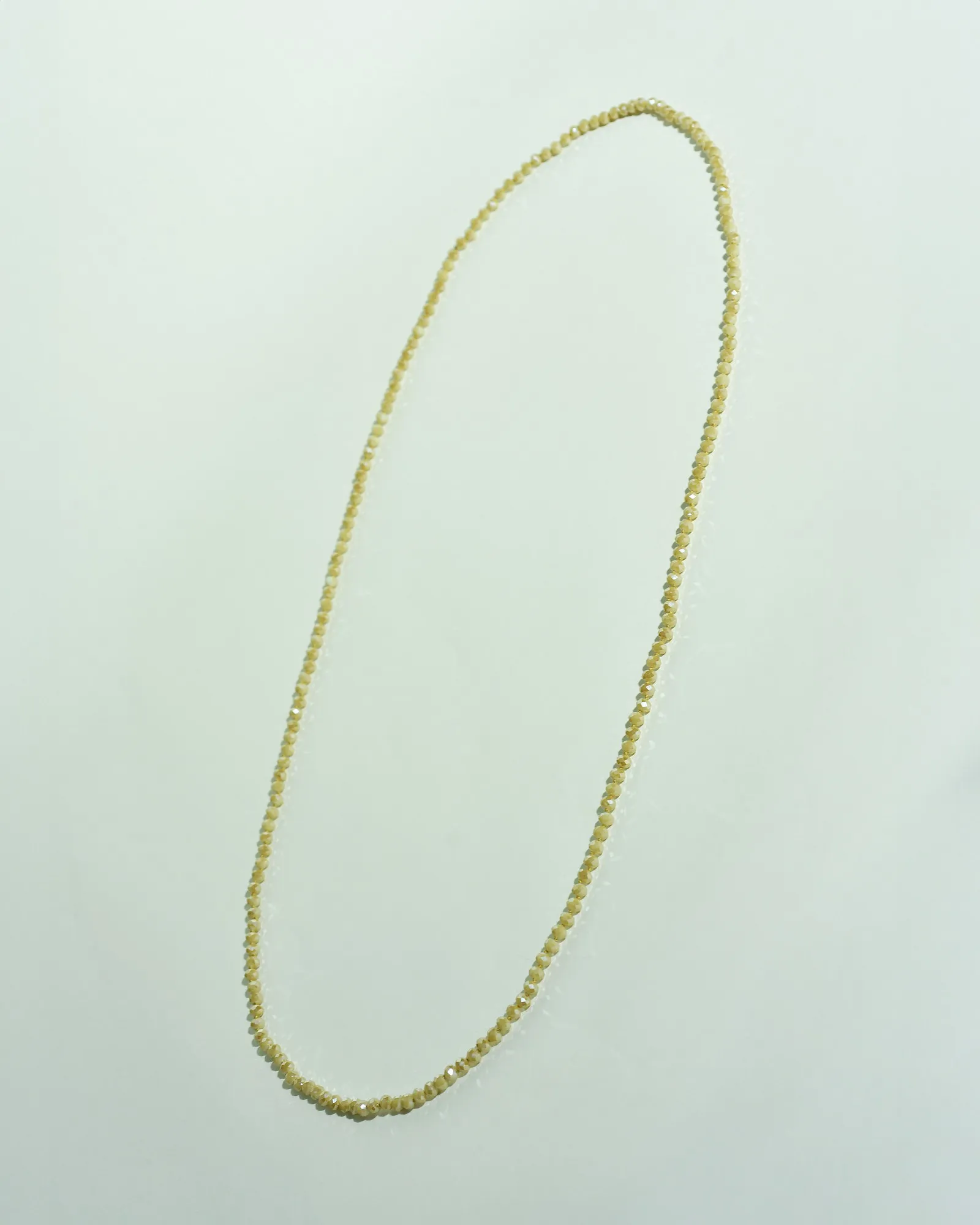 Collier perles beiges Edward Achour 