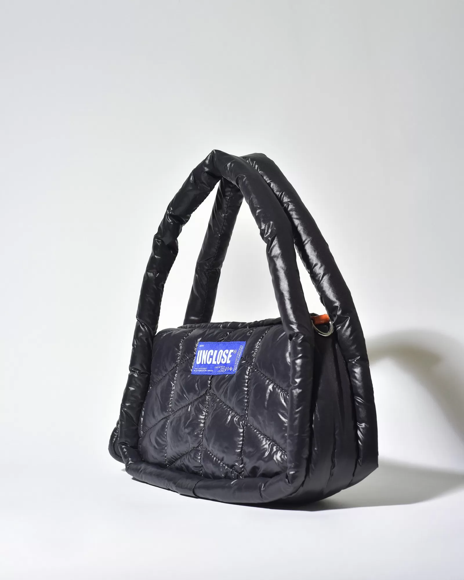 Sac porté épaule en tissu technique noir matelassé Unclose 