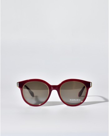 Lunettes rondes en acétate rouge à détails dorés Carven 