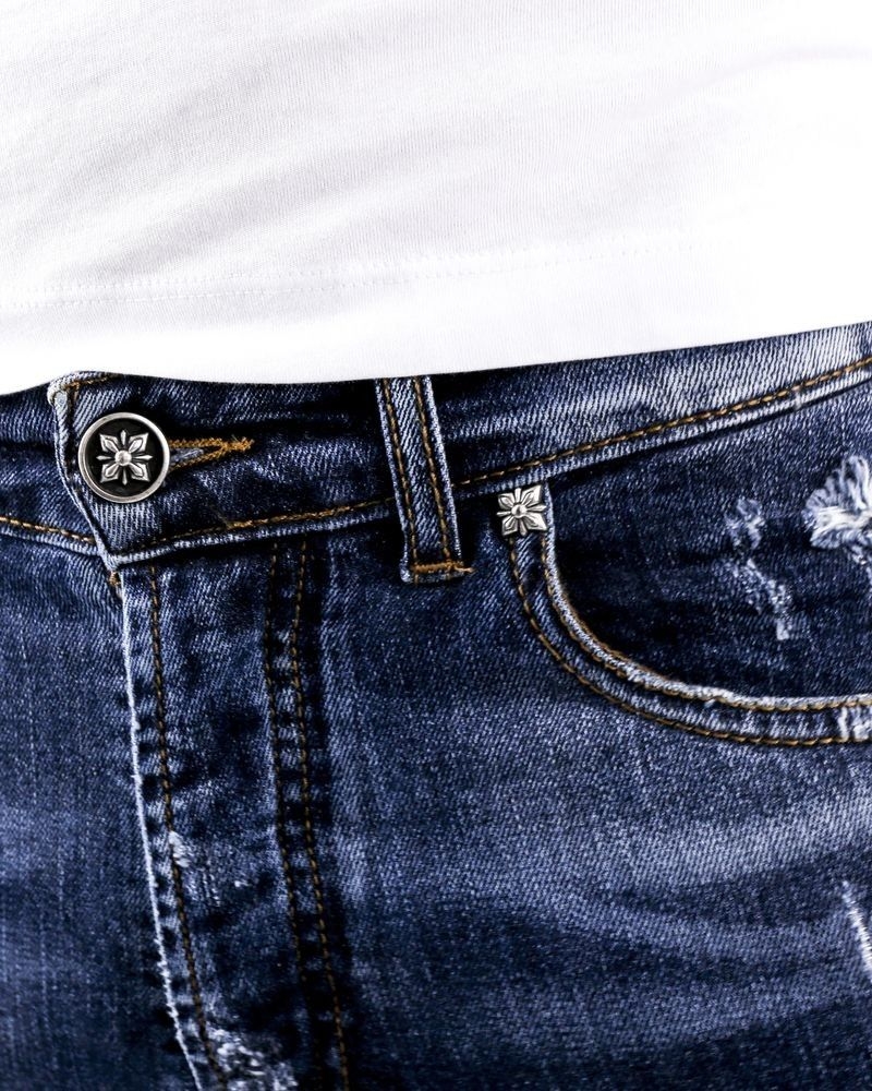 Jean skinny délavé en coton bleu effet usé John Richmond 