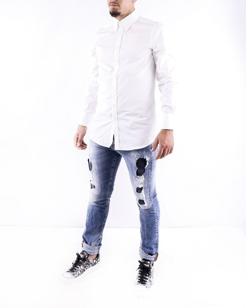 Jean skinny en coton bleu effet dechiré John Richmond 