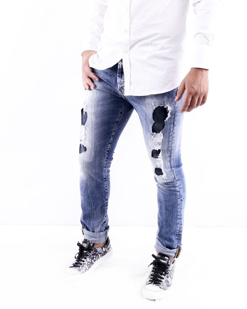 Jean skinny en coton bleu effet dechiré John Richmond 