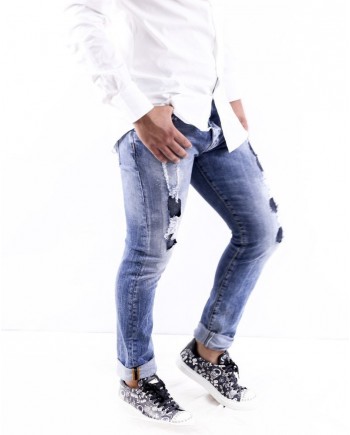 Jean skinny en coton bleu effet dechiré John Richmond 